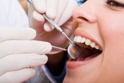 Dentist working on a womans teeth